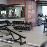 Spacious and fully equipped free weights area at Max Pump Gym